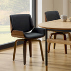 Deux chaises de salle à manger pivotantes en bois tapissées, de style médiéval-moderne