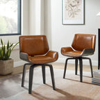 Deux chaises de salle à manger pivotantes en bois tapissées, de style médiéval-moderne