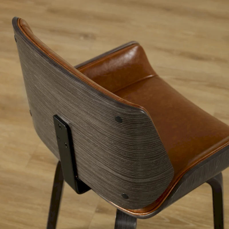 Deux chaises de salle à manger pivotantes en bois tapissées, de style médiéval-moderne