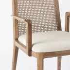 Chaise de salle à manger en tissu crème avec dossier en cannage et cadre en bois massif
